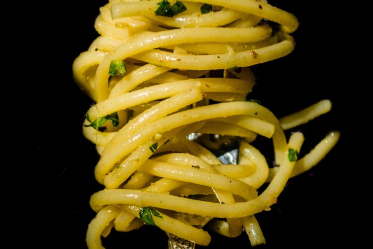 Spaghetti wrapped our a fork